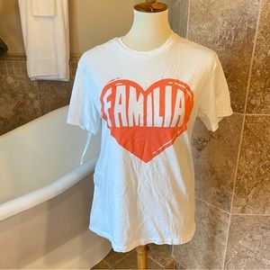 White w/ pinkish letters  "FAMILIA" t-shirt short sleeved size medium
